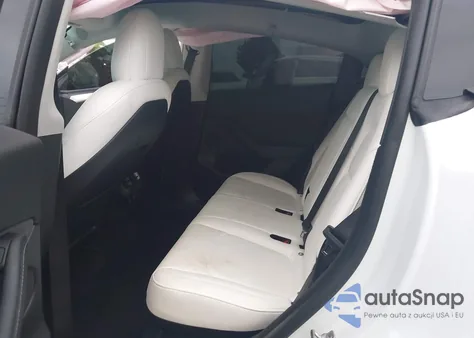 2023 Tesla Model Y Performance Dual Motor All-Wheel Drive z USA, uszkodzony, nr VIN 7SAYGDEF3PF603431